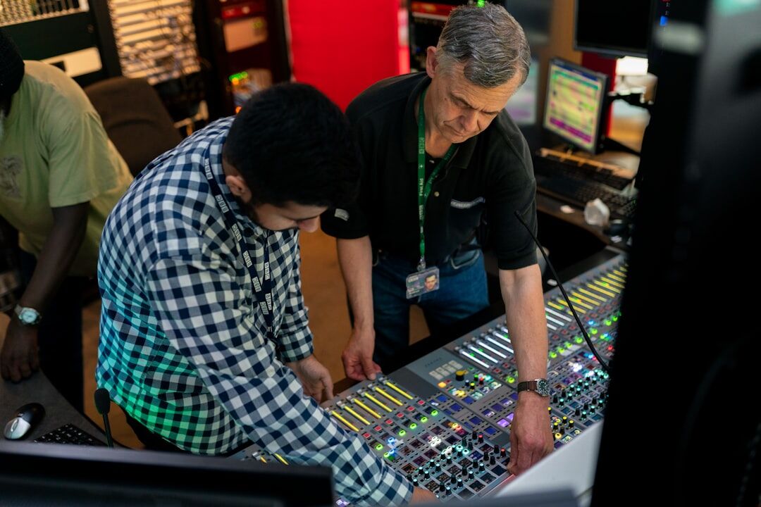 Professional audio mixing console in a broadcast studio